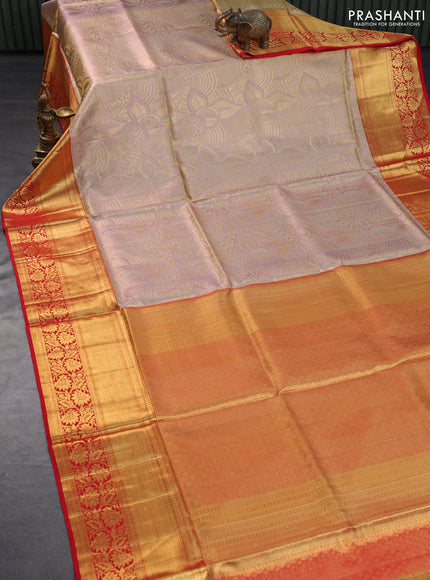 Pure kanchipuram tissue silk saree golddish pink and red with allover zari woven brocade weaves and long rich zari woven floral border