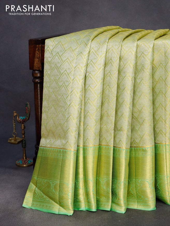 Pure kanchipuram silk saree lime green and pista green with allover zari woven brocade weaves and long rich zari woven annam border