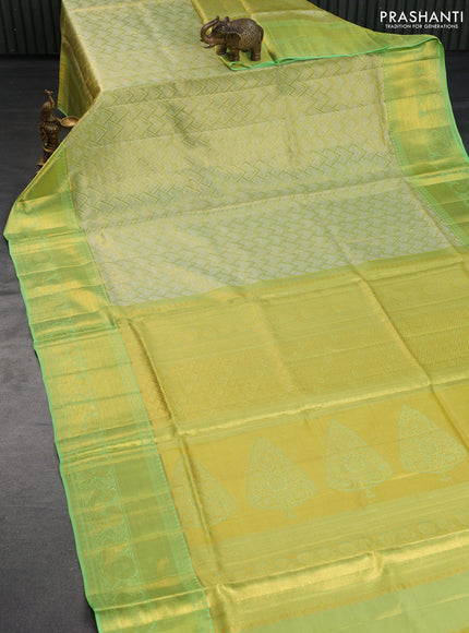 Pure kanchipuram silk saree lime green and pista green with allover zari woven brocade weaves and long rich zari woven annam border