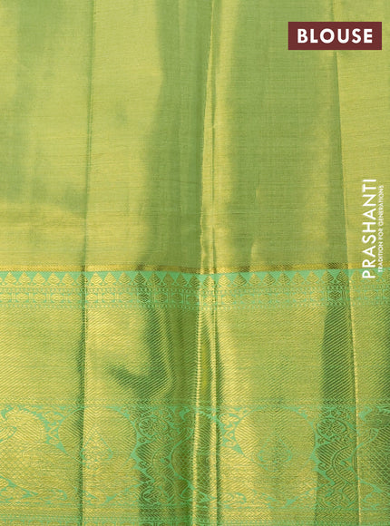 Pure kanchipuram silk saree lime green and pista green with allover zari woven brocade weaves and long rich zari woven annam border