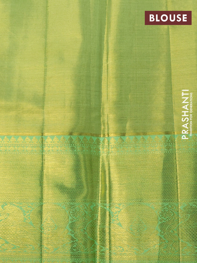 Pure kanchipuram silk saree lime green and pista green with allover zari woven brocade weaves and long rich zari woven annam border