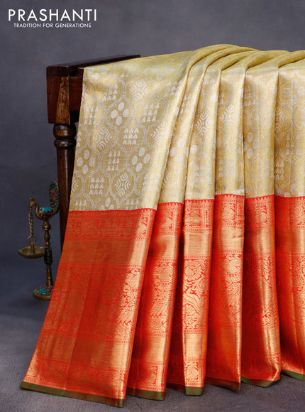 Pure kanchipuram tissue silk saree gold and red with allover zari woven brocade weaves and long rich zari woven border