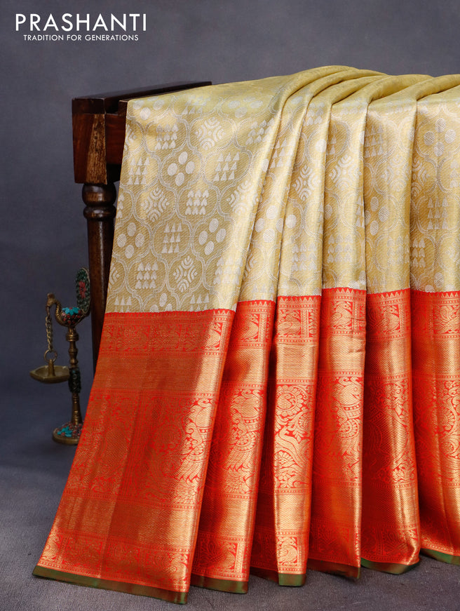 Pure kanchipuram tissue silk saree gold and red with allover zari woven brocade weaves and long rich zari woven border