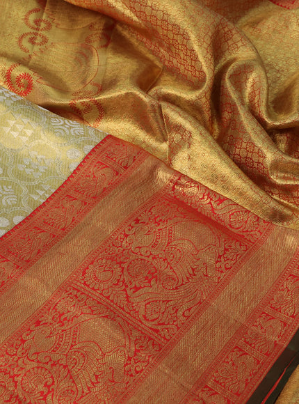 Pure kanchipuram tissue silk saree gold and red with allover zari woven brocade weaves and long rich zari woven border