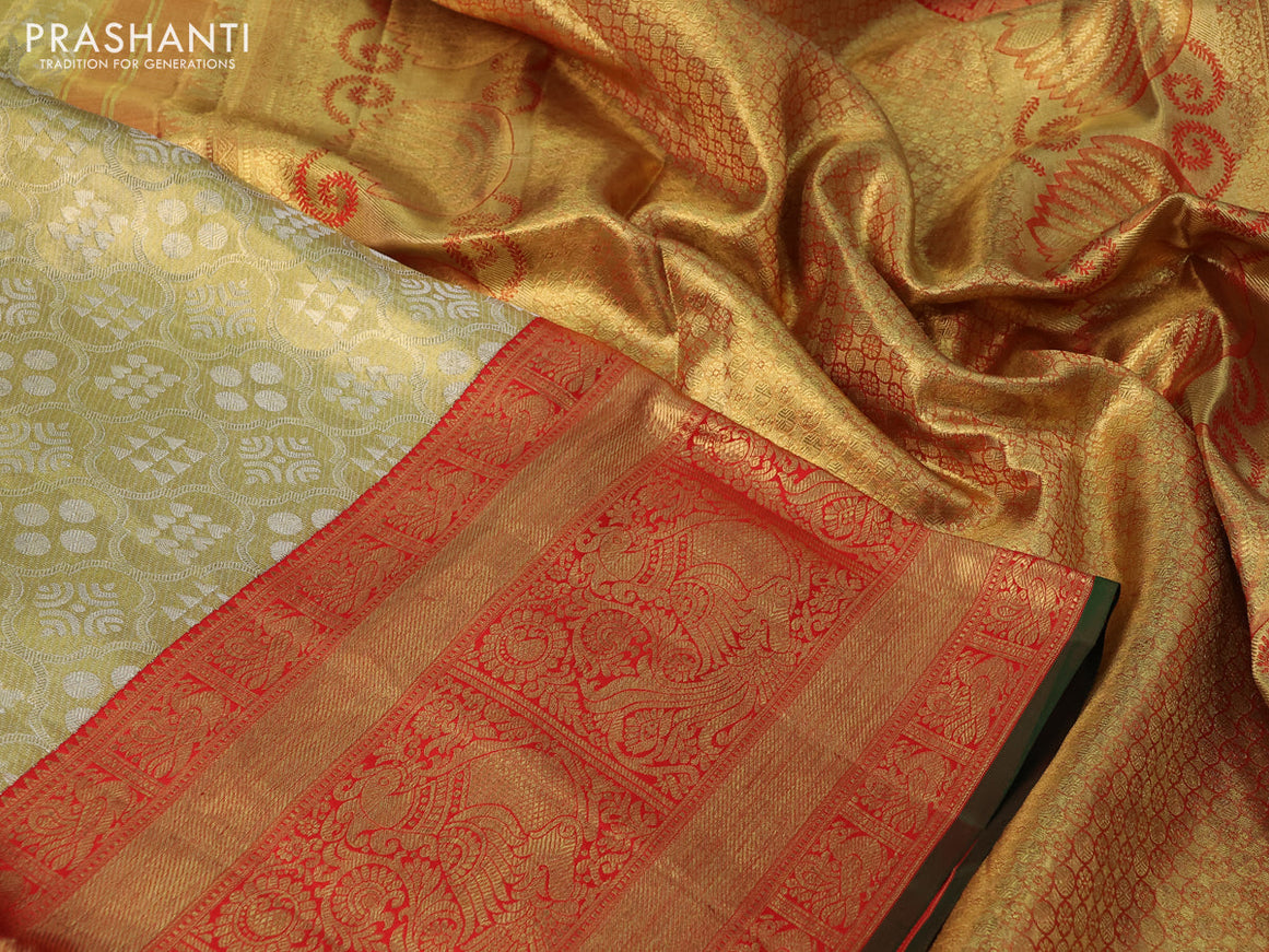 Pure kanchipuram tissue silk saree gold and red with allover zari woven brocade weaves and long rich zari woven border