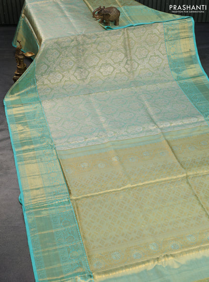 Pure kanchipuram tissue silk saree gold and teal blue with allover zari woven brocade weaves and long rich zari woven border