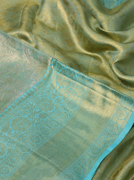 Pure kanchipuram tissue silk saree gold and teal blue with allover zari woven brocade weaves and long rich zari woven border