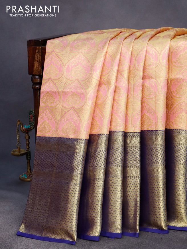 Pure kanchipuram tissue silk saree peach pink and blue with allover zari woven brocade weaves and long rich zari woven border