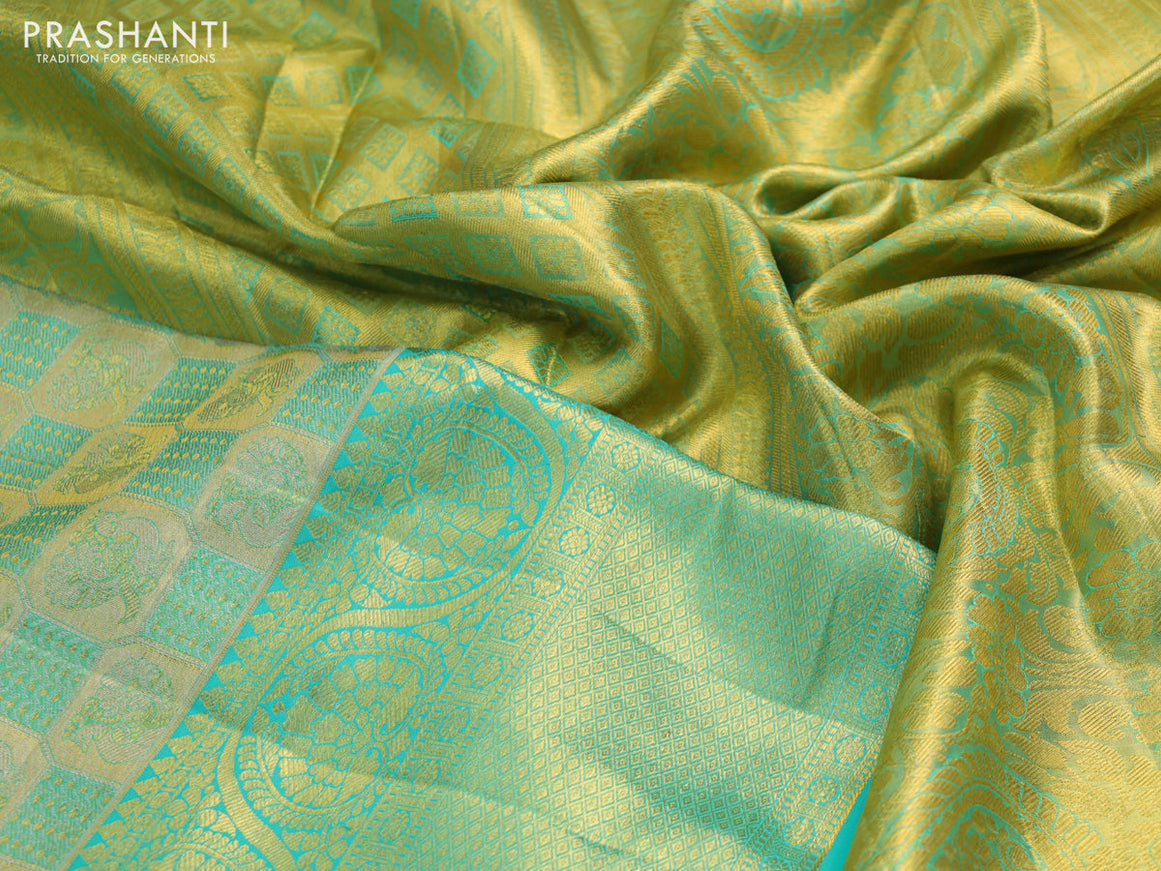 Pure kanchipuram tissue silk saree gold and teal blue with allover annam zari woven brocade weaves and long rich zari woven border