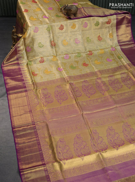 Pure kanchipuram tissue silk saree gold and dual shade of purple with allover zari woven floral brocade weaves and temple design rich zari woven border