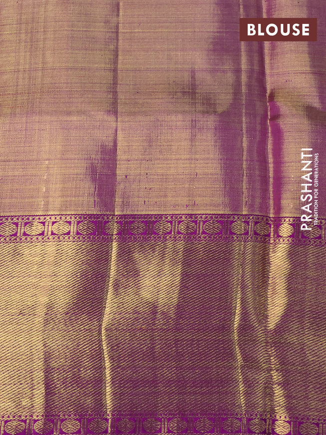 Pure kanchipuram tissue silk saree gold and dual shade of purple with allover zari woven floral brocade weaves and temple design rich zari woven border