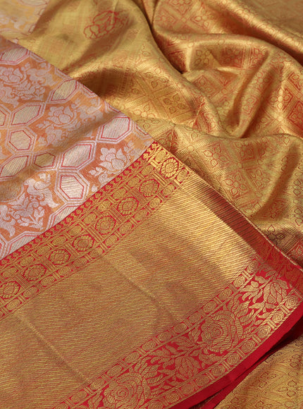 Pure kanchipuram tissue silk saree dual shade of red and red with allover zari woven geometric brocade weaves and long rich zari woven border