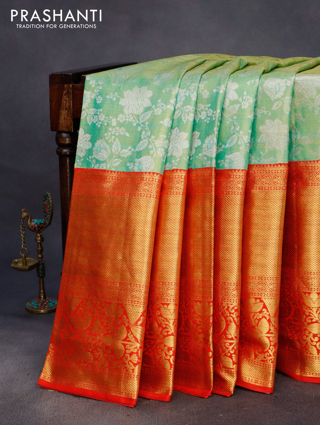 Pure kanchipuram tissue silk saree teal green shade and red with allover zari woven brocade weaves and long rich zari woven border