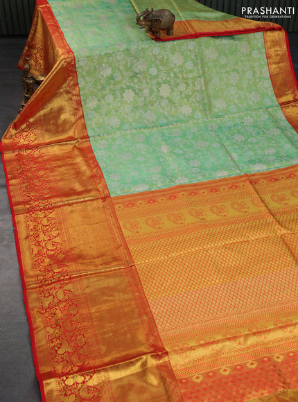 Pure kanchipuram tissue silk saree teal green shade and red with allover zari woven brocade weaves and long rich zari woven border