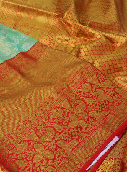 Pure kanchipuram tissue silk saree teal green shade and red with allover zari woven brocade weaves and long rich zari woven border