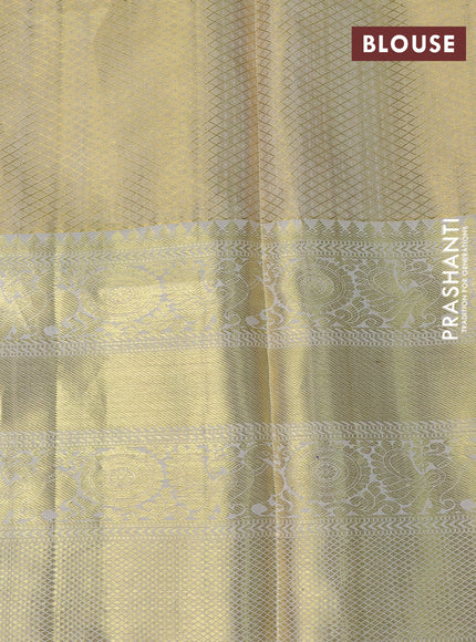 Pure kanchipuram tissue silk saree cream with allover zari woven brocade weaves and long rich zari woven border