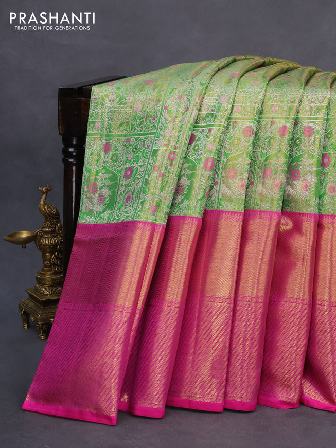 Pure kanchipuram tissue silk saree light green and pink with allover silver zari woven brocade weaves and long zari woven border