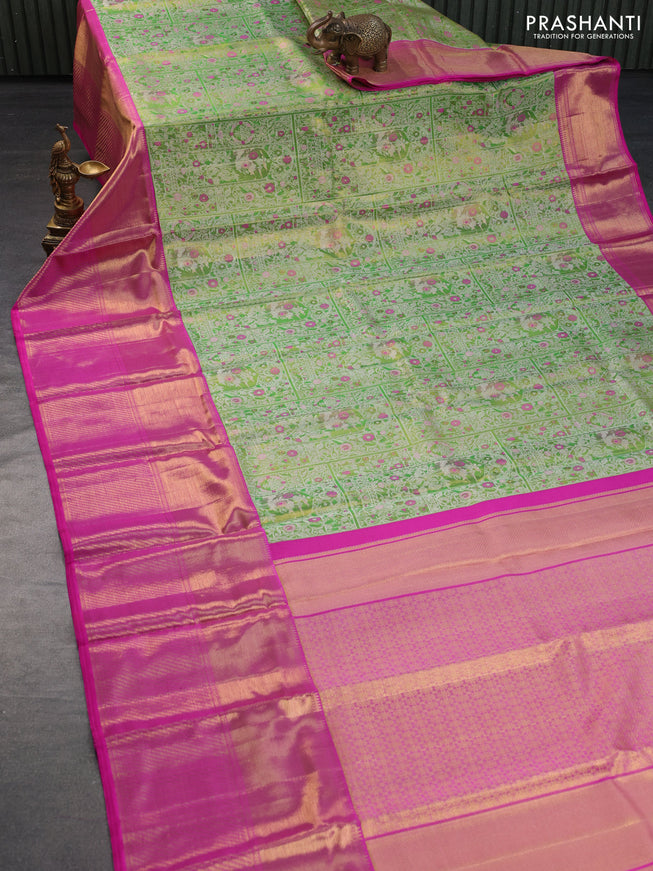 Pure kanchipuram tissue silk saree light green and pink with allover silver zari woven brocade weaves and long zari woven border