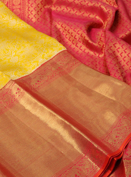 Pure kanchipuram silk saree yellow and pink with allover silver zari weaves and long rich zari woven border