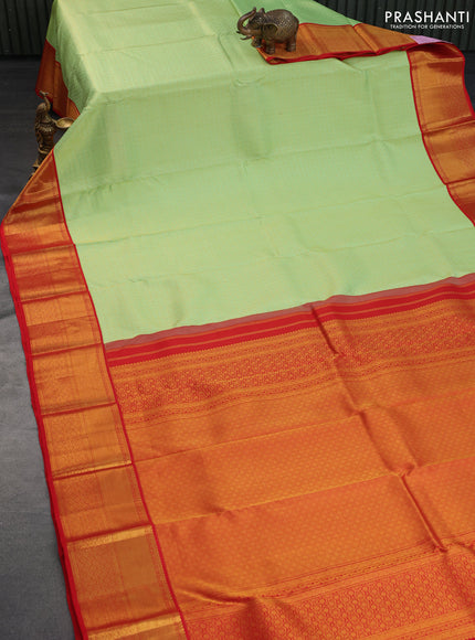 Pure kanchipuram silk saree pista green and red with allover zari checks & butta brocade weaves and zari woven border border