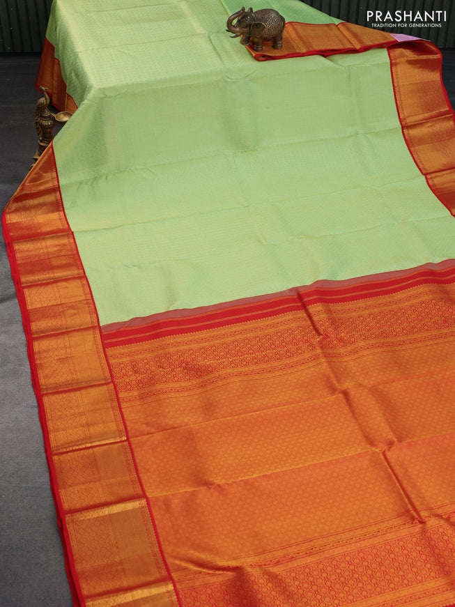 Pure kanchipuram silk saree pista green and red with allover zari checks & butta brocade weaves and zari woven border border