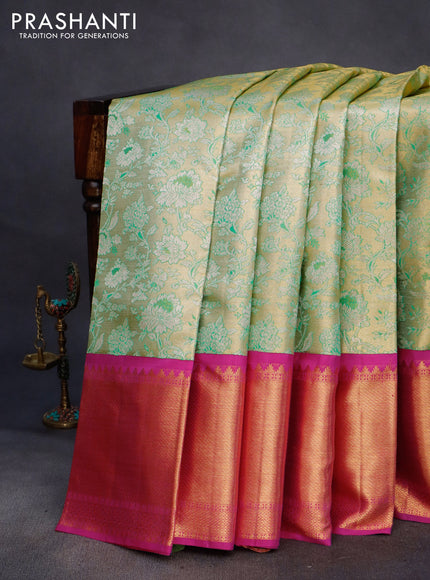 Pure kanchipuram silk saree dual shade of green and pink with allover zari woven floral brocade weaves and long zari woven korvai border