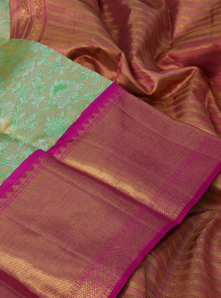 Pure kanchipuram silk saree dual shade of green and pink with allover zari woven floral brocade weaves and long zari woven korvai border