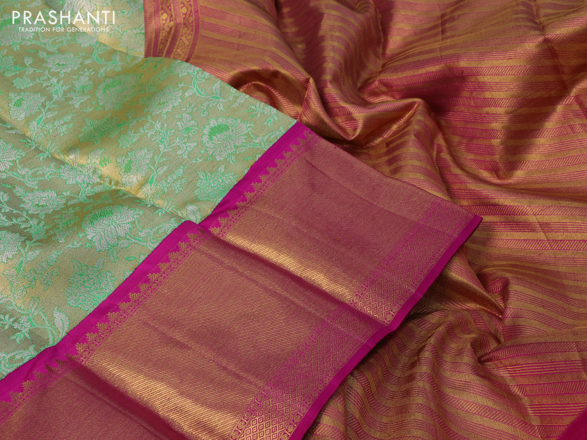 Pure kanchipuram silk saree dual shade of green and pink with allover zari woven floral brocade weaves and long zari woven korvai border