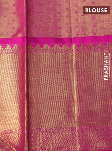 Pure kanchipuram silk saree dual shade of green and pink with allover zari woven floral brocade weaves and long zari woven korvai border