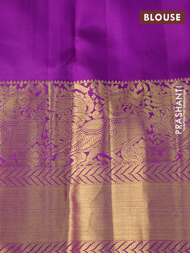 Pure kanchipuram silk saree pista green and violet with allover silver zari weaves and long annam zari woven korvai border