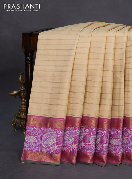 Pure kanchipuram silk saree cream and lavender shade with allover zari checked pattern and embroidery work zari border