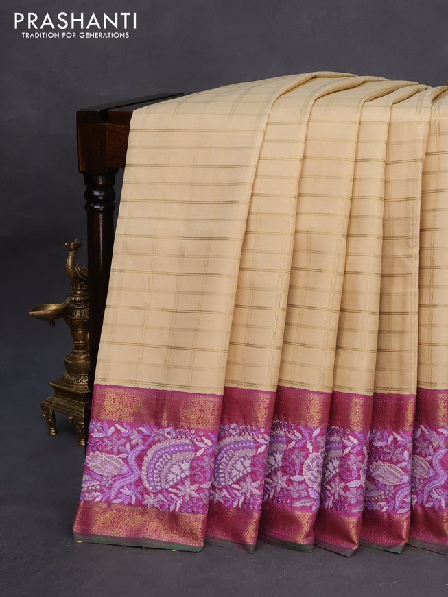 Pure kanchipuram silk saree cream and lavender shade with allover zari checked pattern and embroidery work zari border