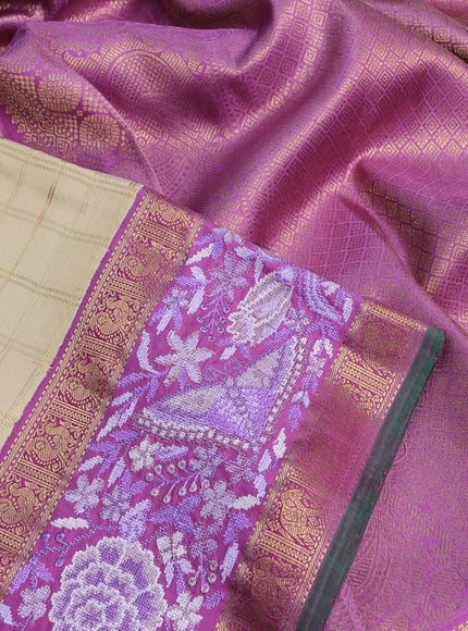 Pure kanchipuram silk saree cream and lavender shade with allover zari checked pattern and embroidery work zari border