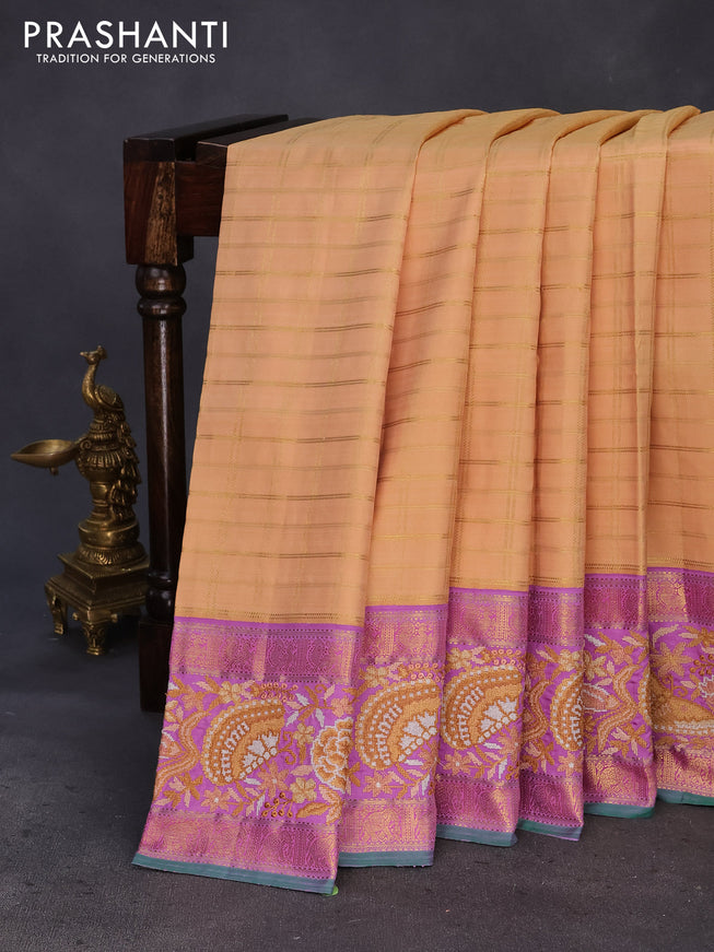 Pure kanchipuram silk saree sandal and lavender shade with allover zari checked pattern and embroidery work zari border