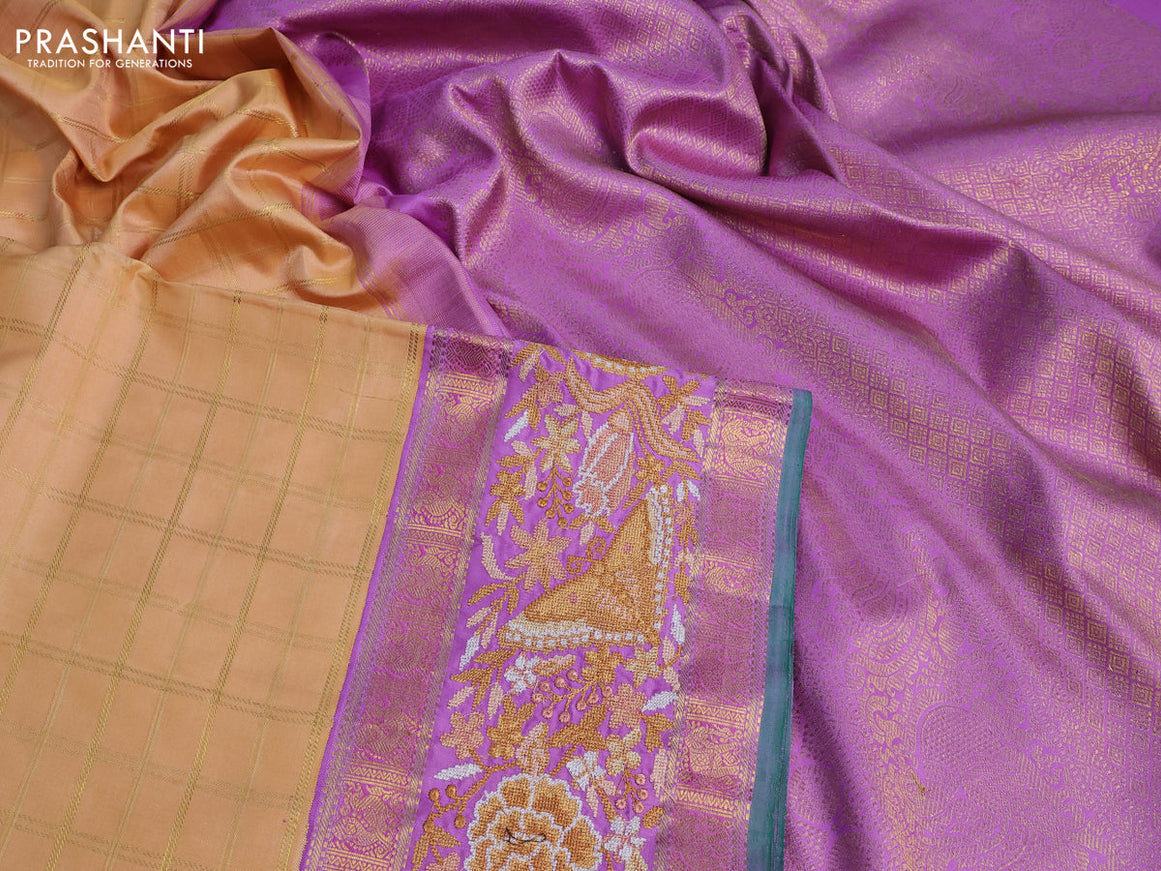 Pure kanchipuram silk saree sandal and lavender shade with allover zari checked pattern and embroidery work zari border