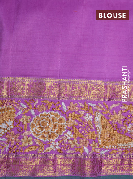 Pure kanchipuram silk saree sandal and lavender shade with allover zari checked pattern and embroidery work zari border