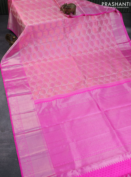 Pure kanchipuram silk saree candy pink with allover floral design zari weaves and silver zari woven border & embroidery work blouse