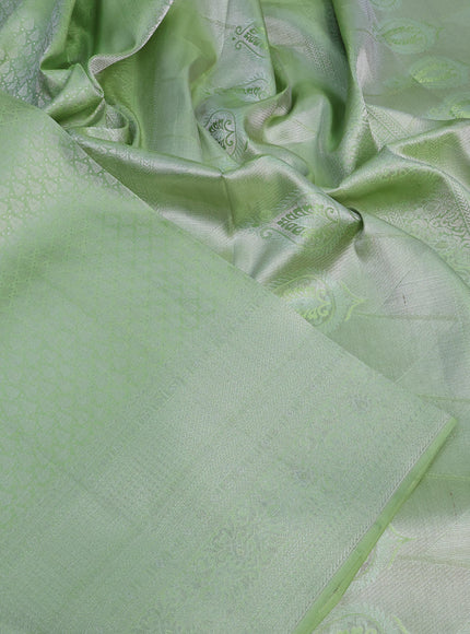 Pure kanchipuram silk saree pastel green with allover silver zari woven brocade weaves and silver zari woven border & embroidery work blouse