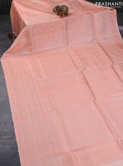 Pure kanchipuram silk saree peach shade with allover copper zari woven brocade weaves and copper zari woven border & embroidery work blouse