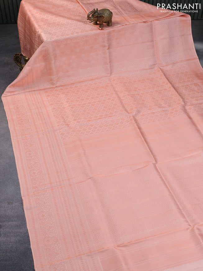 Pure kanchipuram silk saree peach shade with allover copper zari woven brocade weaves and copper zari woven border & embroidery work blouse