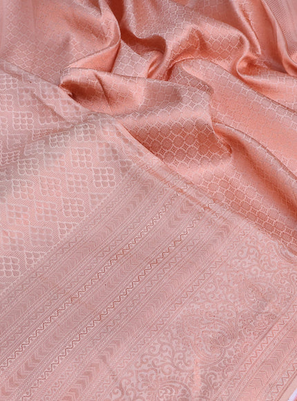 Pure kanchipuram silk saree peach shade with allover copper zari woven brocade weaves and copper zari woven border & embroidery work blouse