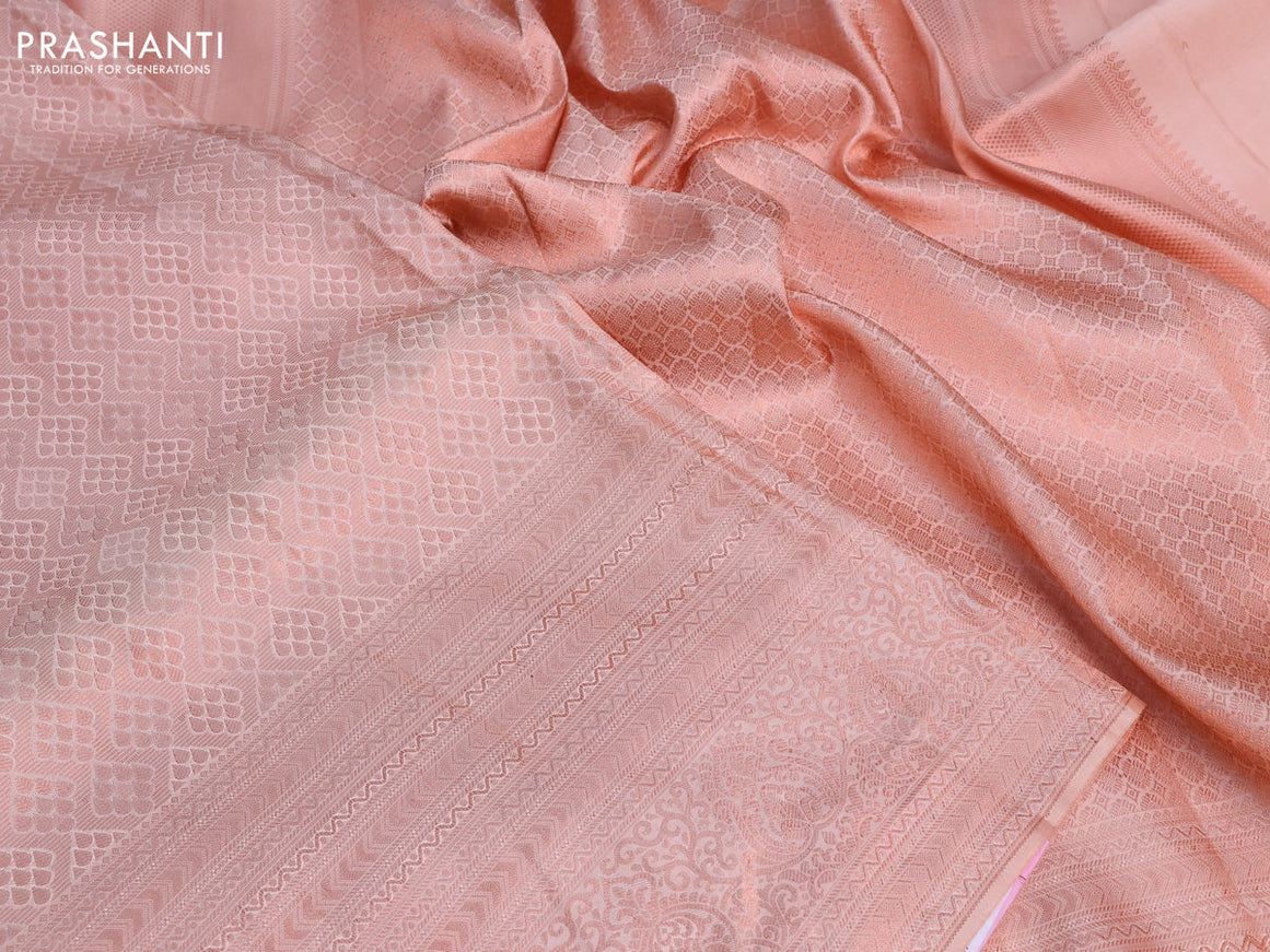 Pure kanchipuram silk saree peach shade with allover copper zari woven brocade weaves and copper zari woven border & embroidery work blouse