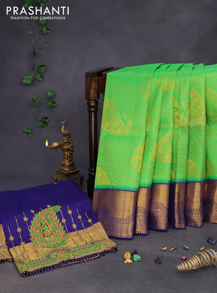 Pure kanchipuram silk saree light green and dark blue with allover zari woven brocade weaves and zari woven border & embroidery work blouse