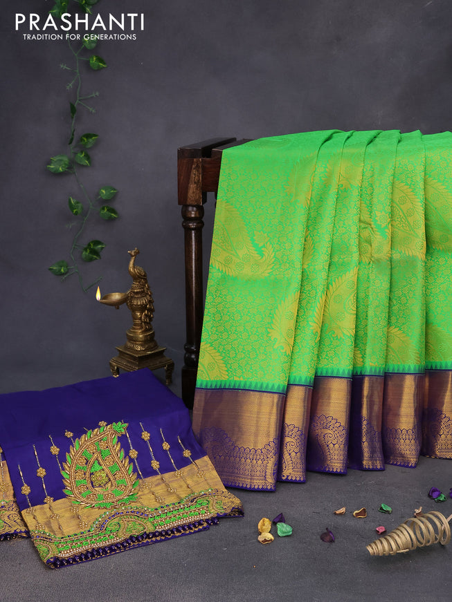 Pure kanchipuram silk saree light green and dark blue with allover zari woven brocade weaves and zari woven border & embroidery work blouse