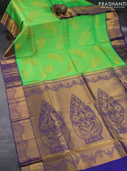 Pure kanchipuram silk saree light green and dark blue with allover zari woven brocade weaves and zari woven border & embroidery work blouse