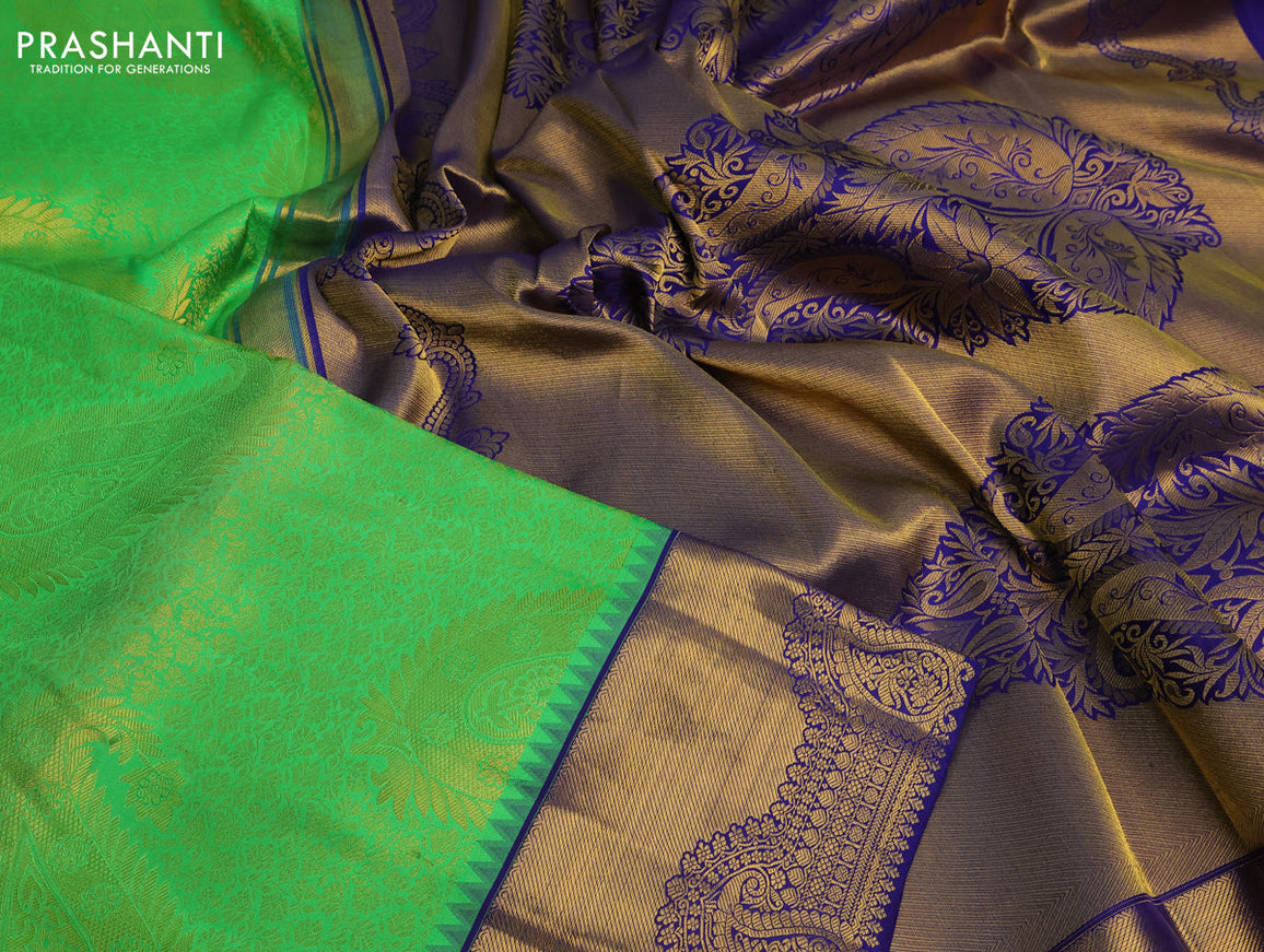 Pure kanchipuram silk saree light green and dark blue with allover zari woven brocade weaves and zari woven border & embroidery work blouse