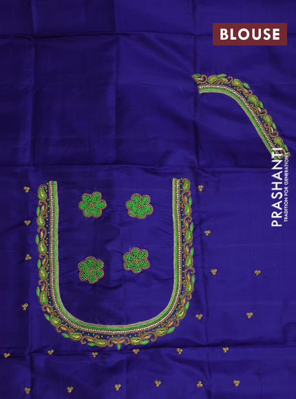 Pure kanchipuram silk saree light green and dark blue with allover zari woven brocade weaves and zari woven border & embroidery work blouse