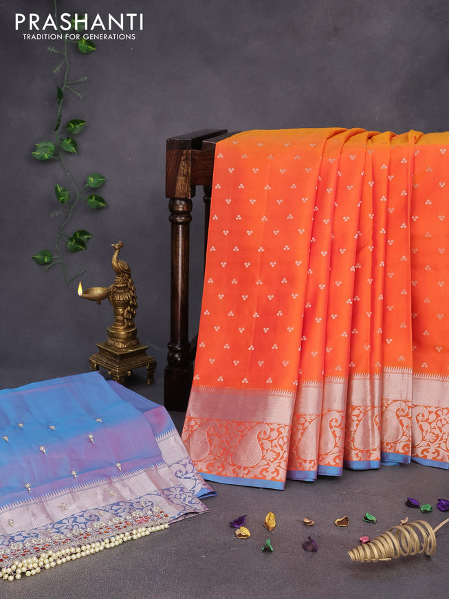 Pure kanchipuram silk saree dual shade of orange and blue with allover silver zari woven buttas and silver zari woven border & embroidery work blouse