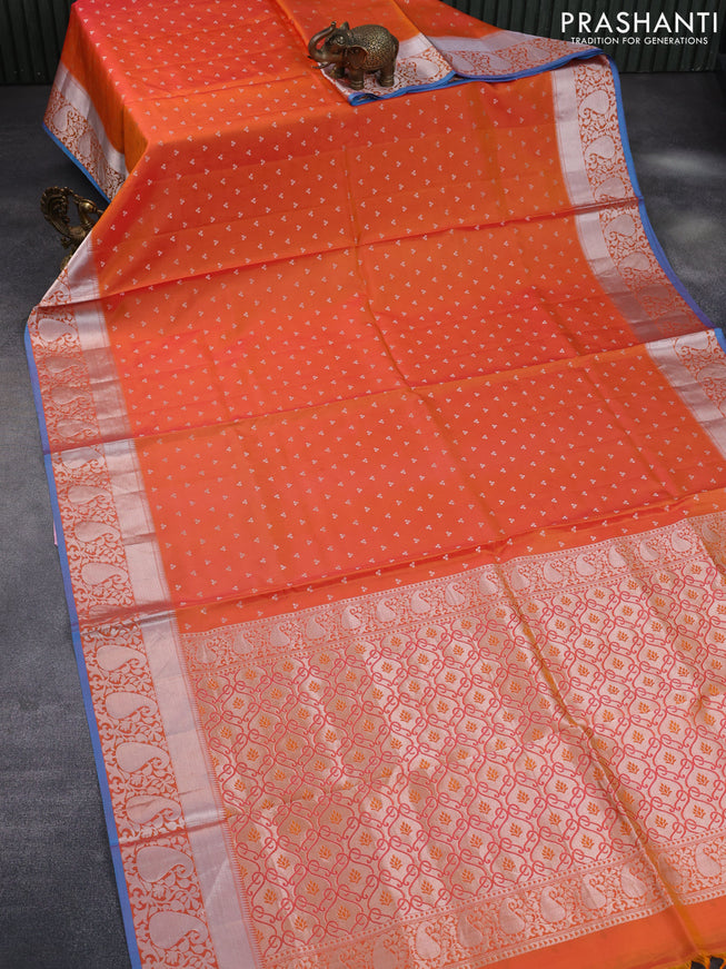 Pure kanchipuram silk saree dual shade of orange and blue with allover silver zari woven buttas and silver zari woven border & embroidery work blouse