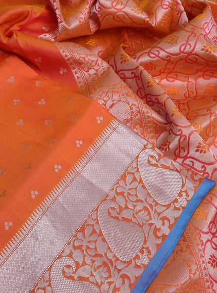 Pure kanchipuram silk saree dual shade of orange and blue with allover silver zari woven buttas and silver zari woven border & embroidery work blouse